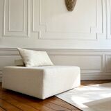 Square ottoman and its cushions in buckle fabric