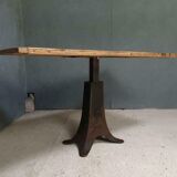 Old table on cast iron machine leg