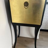 Secrétaire noir et feuilles d’or