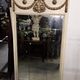 Louis XVI style trumeau mirror with a painted wooden frame.