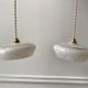 Pair of suspensions in white Clichy glass and golden edging 40s-50s