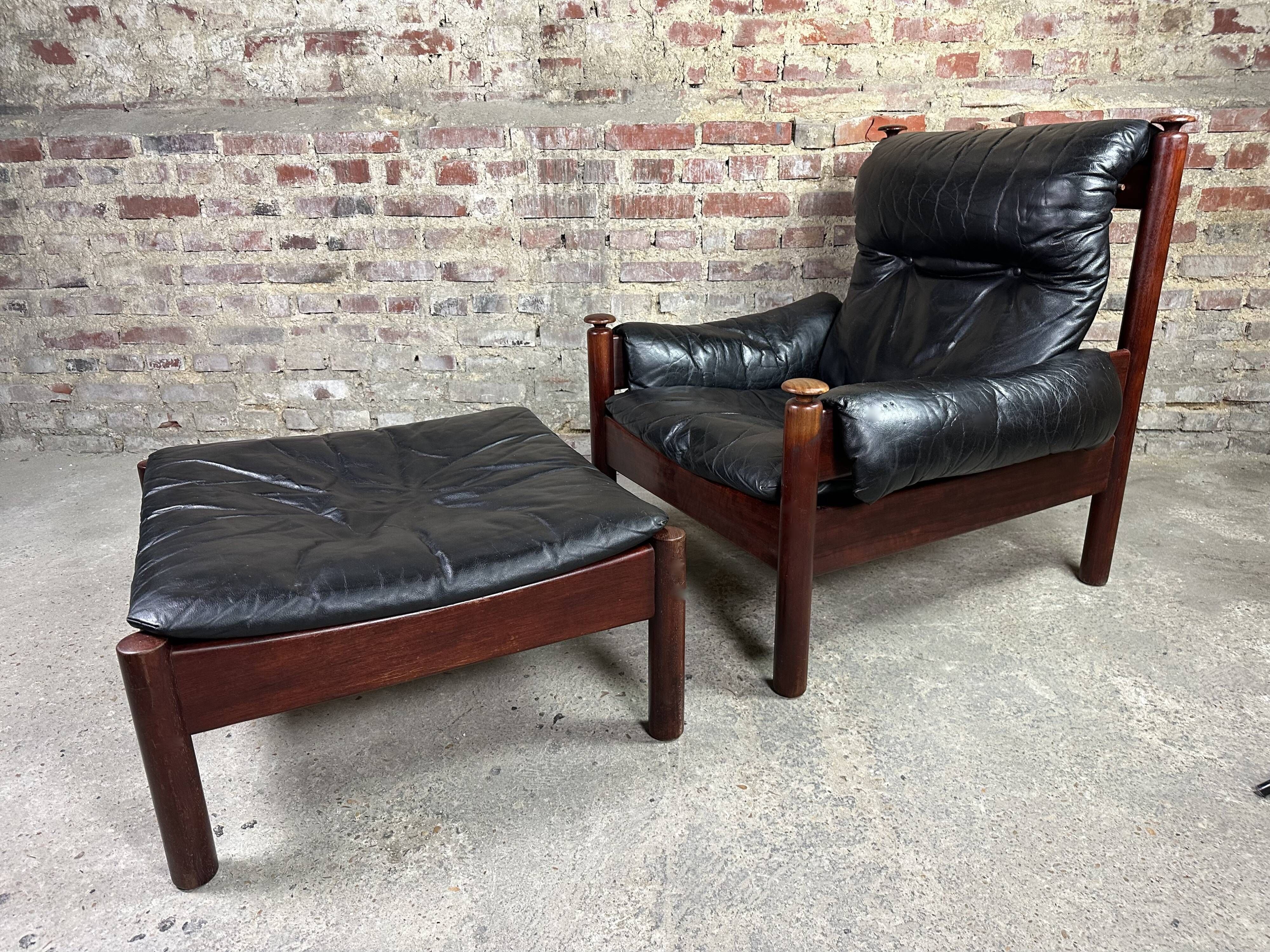 Admiral armchair and its ottoman by Erik Merthen Sweden vintage 1960