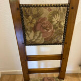 Antique chair with upholstered fabric seat