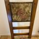 Antique chair with upholstered fabric seat