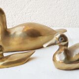 Trio of brass ducks