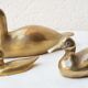 Trio of brass ducks