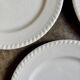 4 assiettes à dessert en faïence blanche