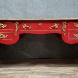 Louis XV style curved center desk in red lacquer and gilded bronze