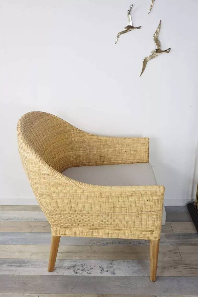 Pair of teak and rattan armchairs