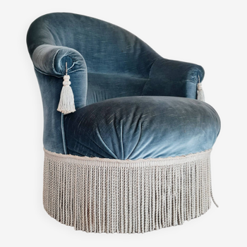 Fauteuil crapaud velours bleu à franges