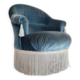 Blue velvet toad armchair with fringes