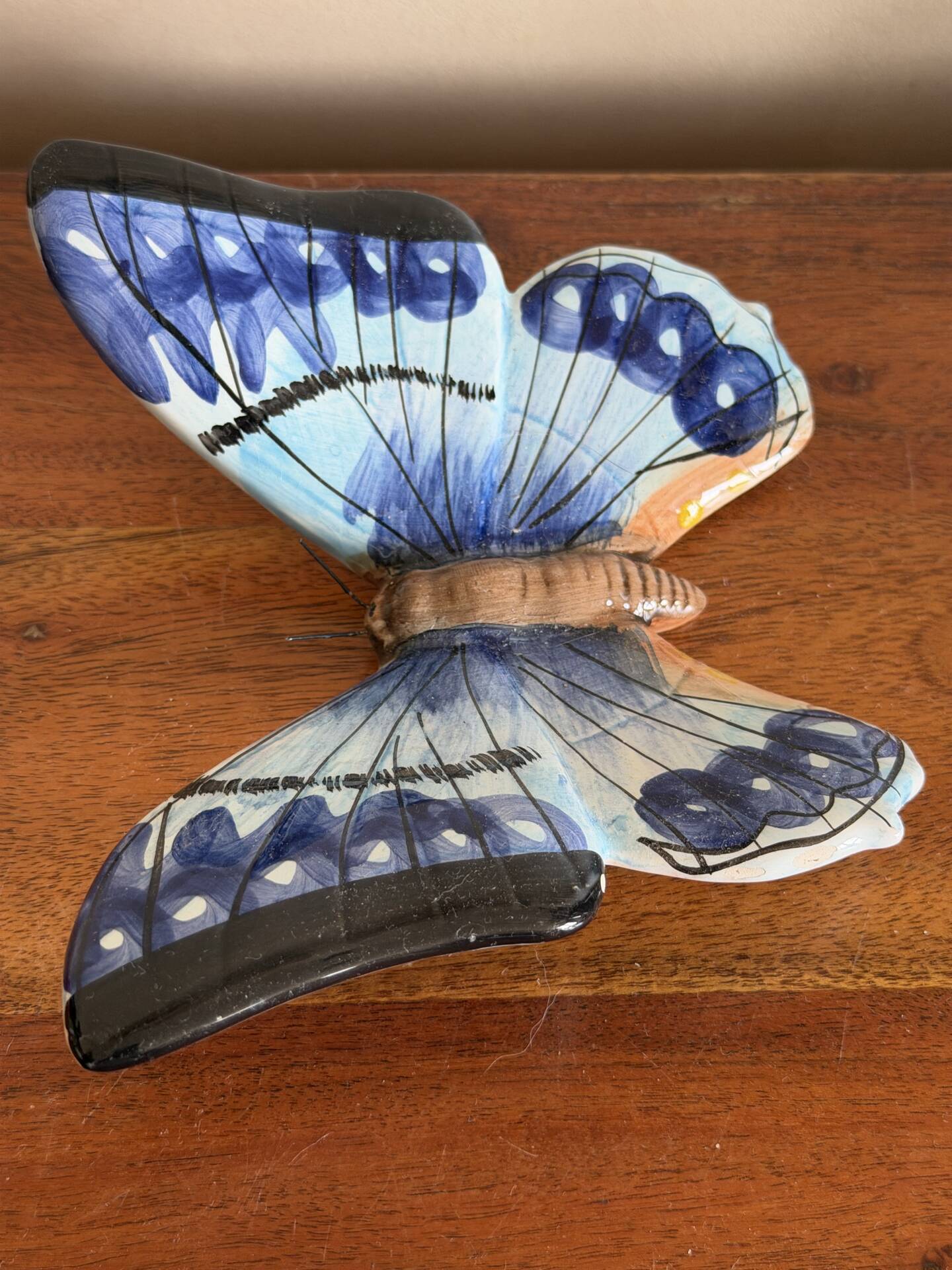 Papillon bleu à accrocher en céramique