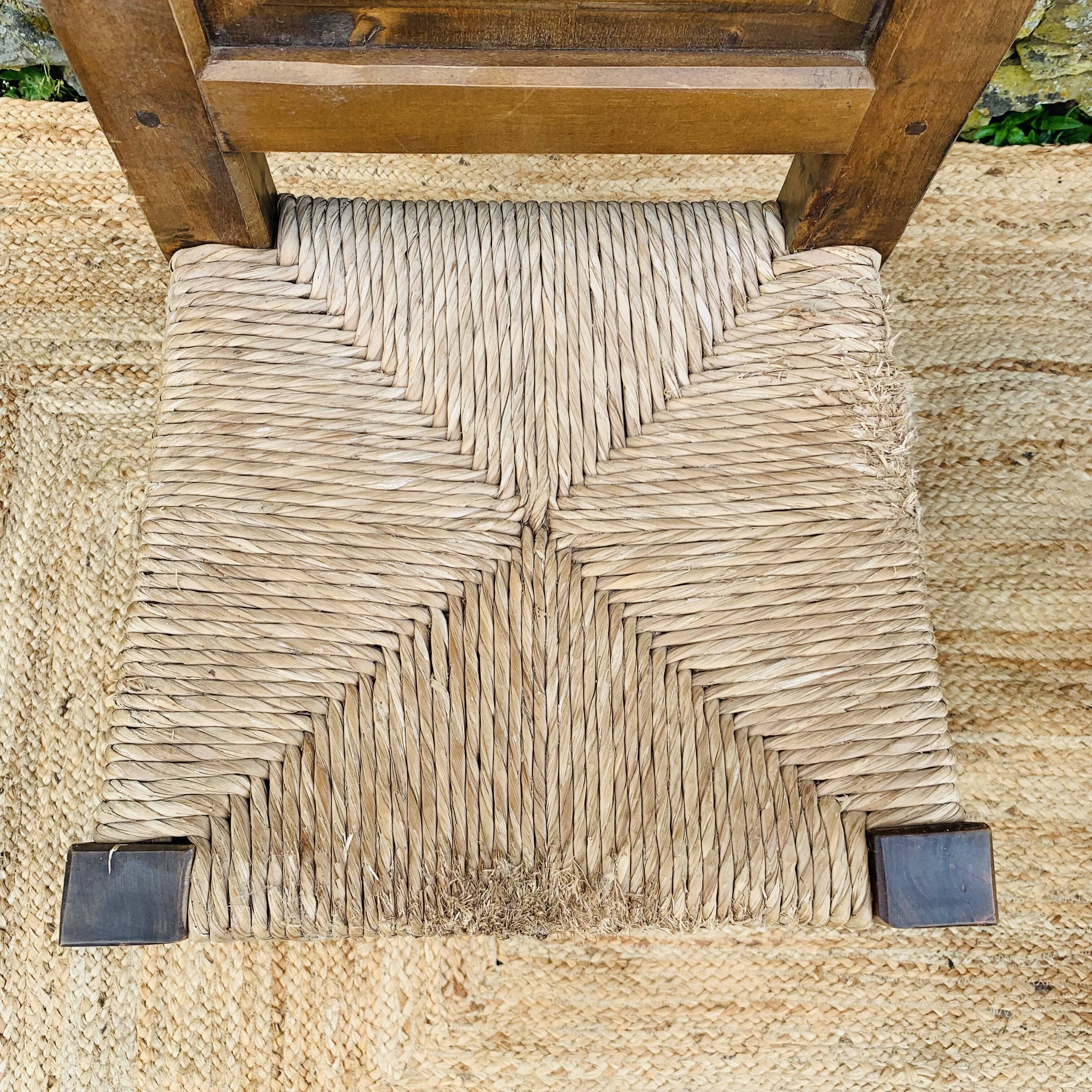 Pair of wooden and straw chairs