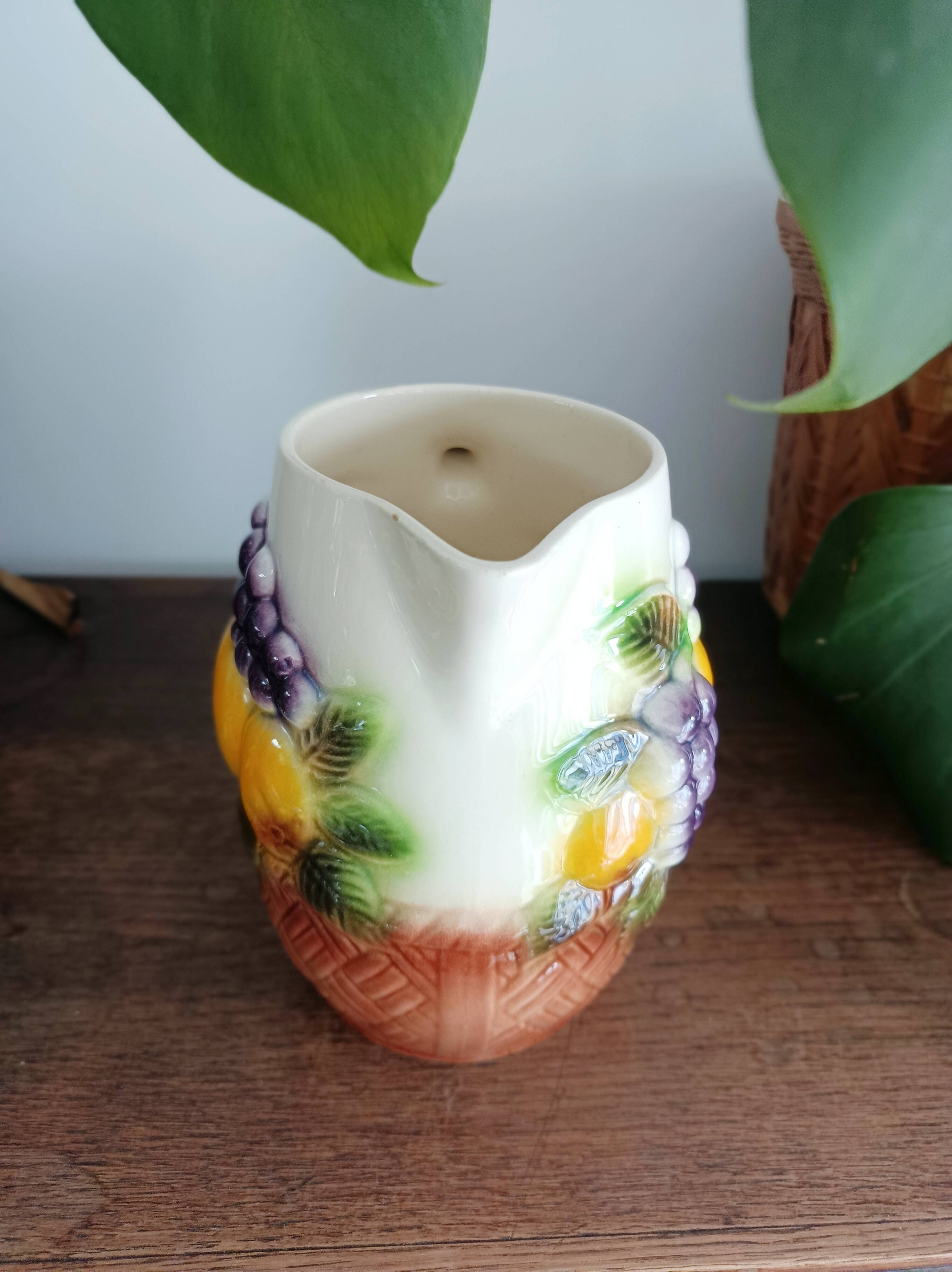 St-Clément pitcher in slip, fruit decoration