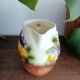 St-Clément pitcher in slip, fruit decoration