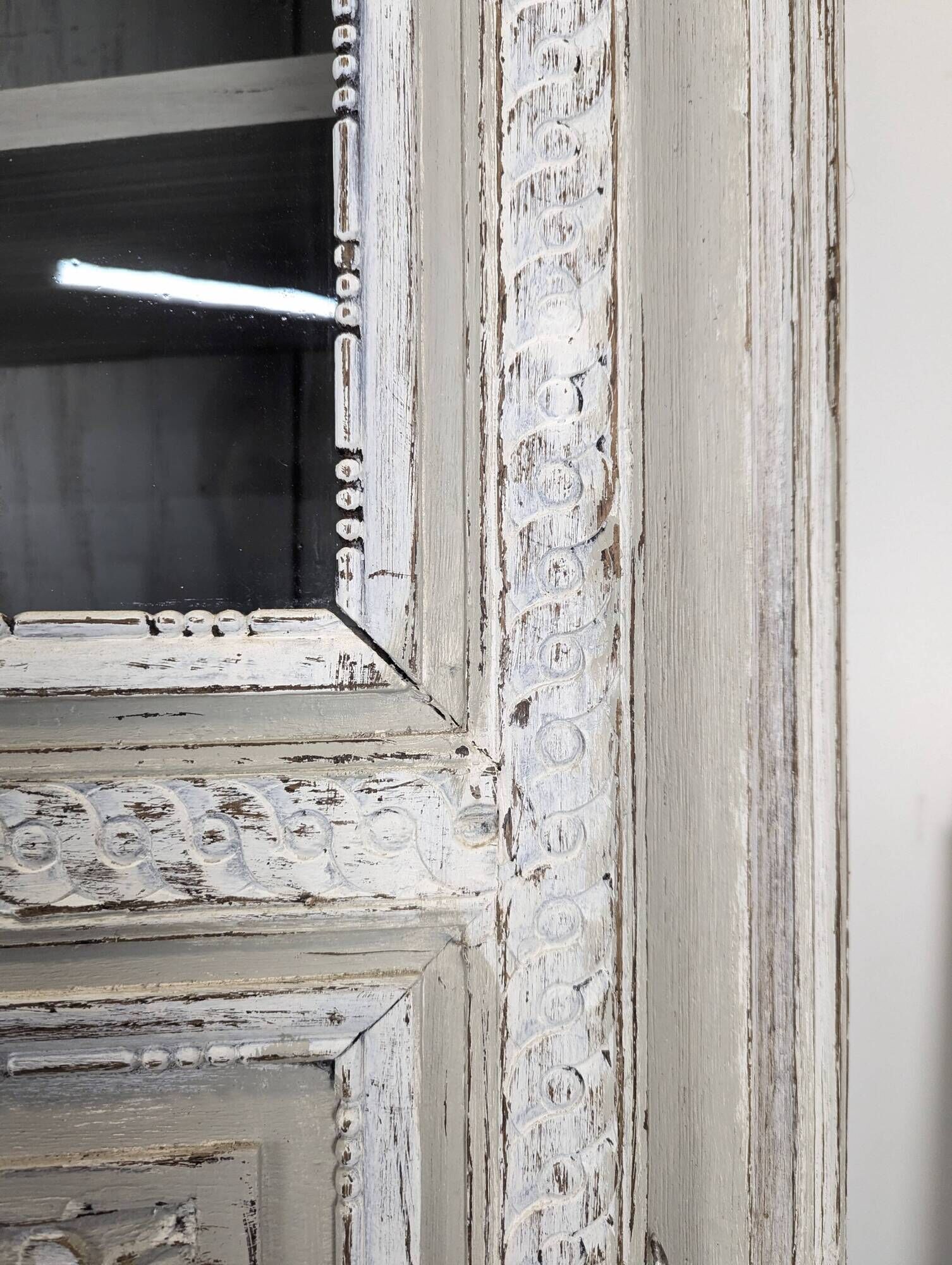Two-body glass buffet in patinated grey and white oak.