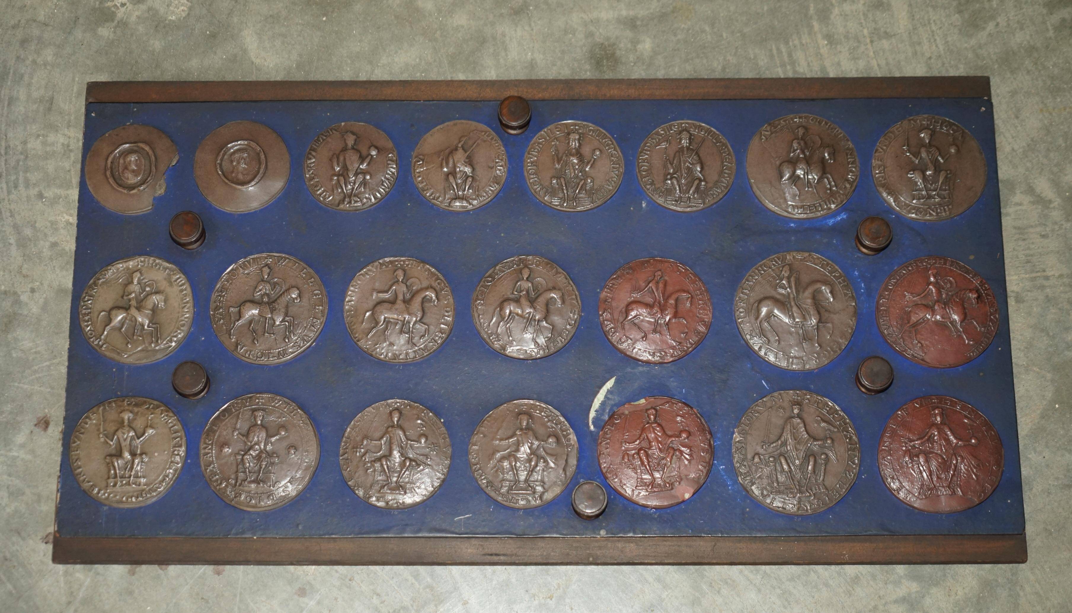Victorian Wellington chest in figured elm by R Crosby & Son with 160 seal impressions.