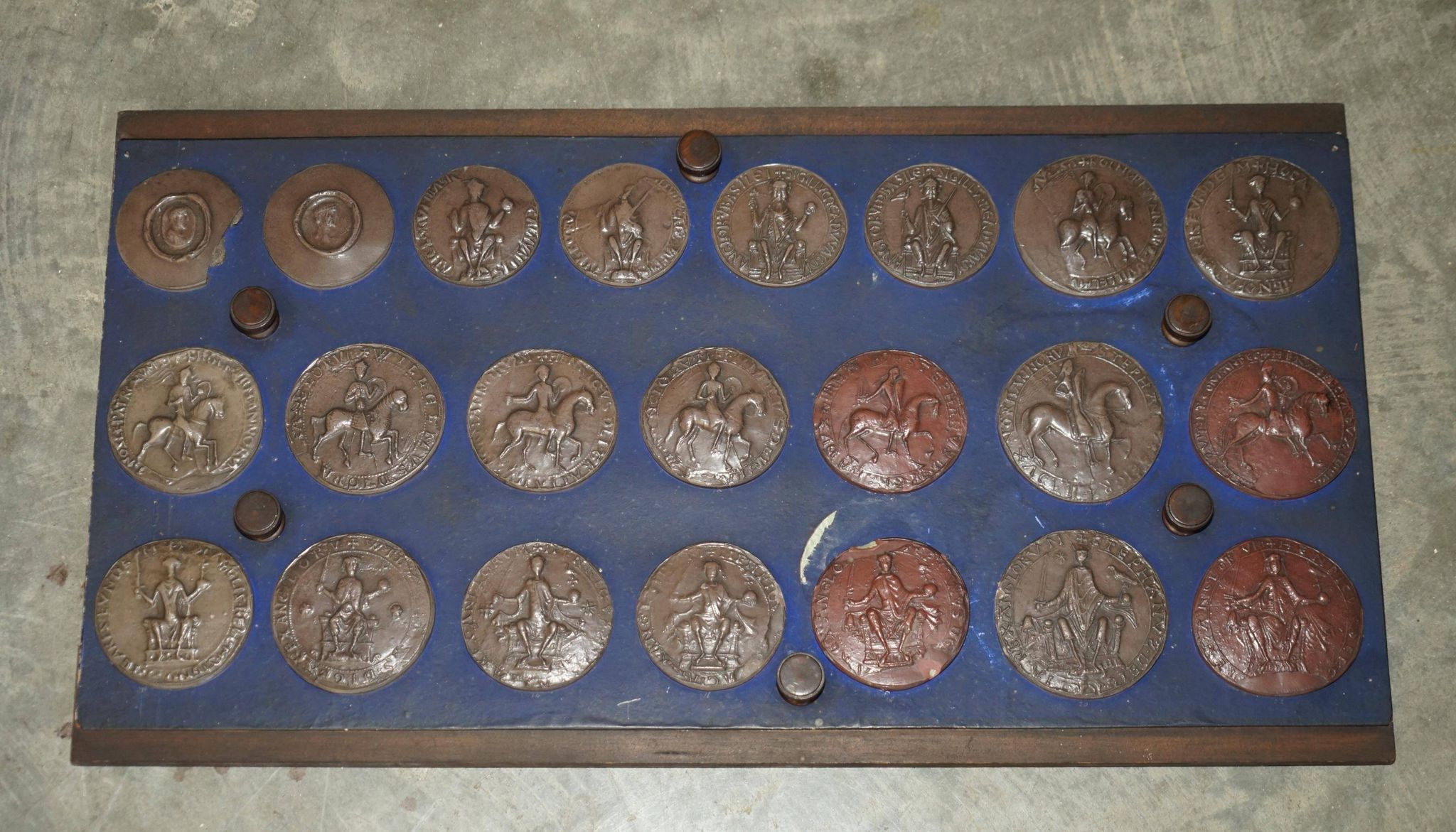 Victorian Wellington chest in figured elm by R Crosby & Son with 160 seal impressions.