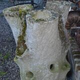 Concrete tree trunk planter