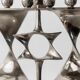 Vintage 1960s silver-plated menorah for Hanukkah, Mid-Century design with rotating Star of David, Judaica decoration, elegant gift idea.