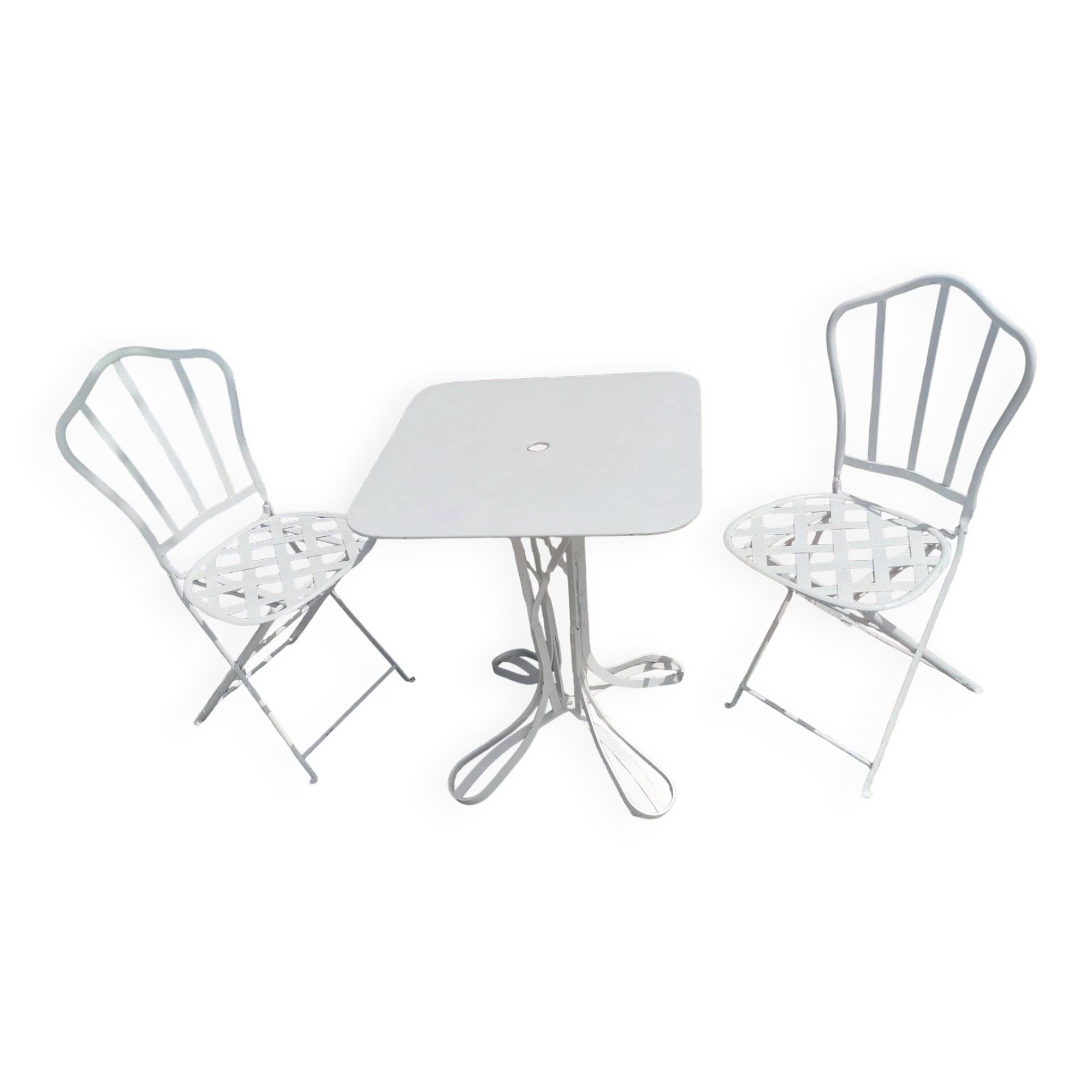 Antique garden furniture in solid wrought iron.