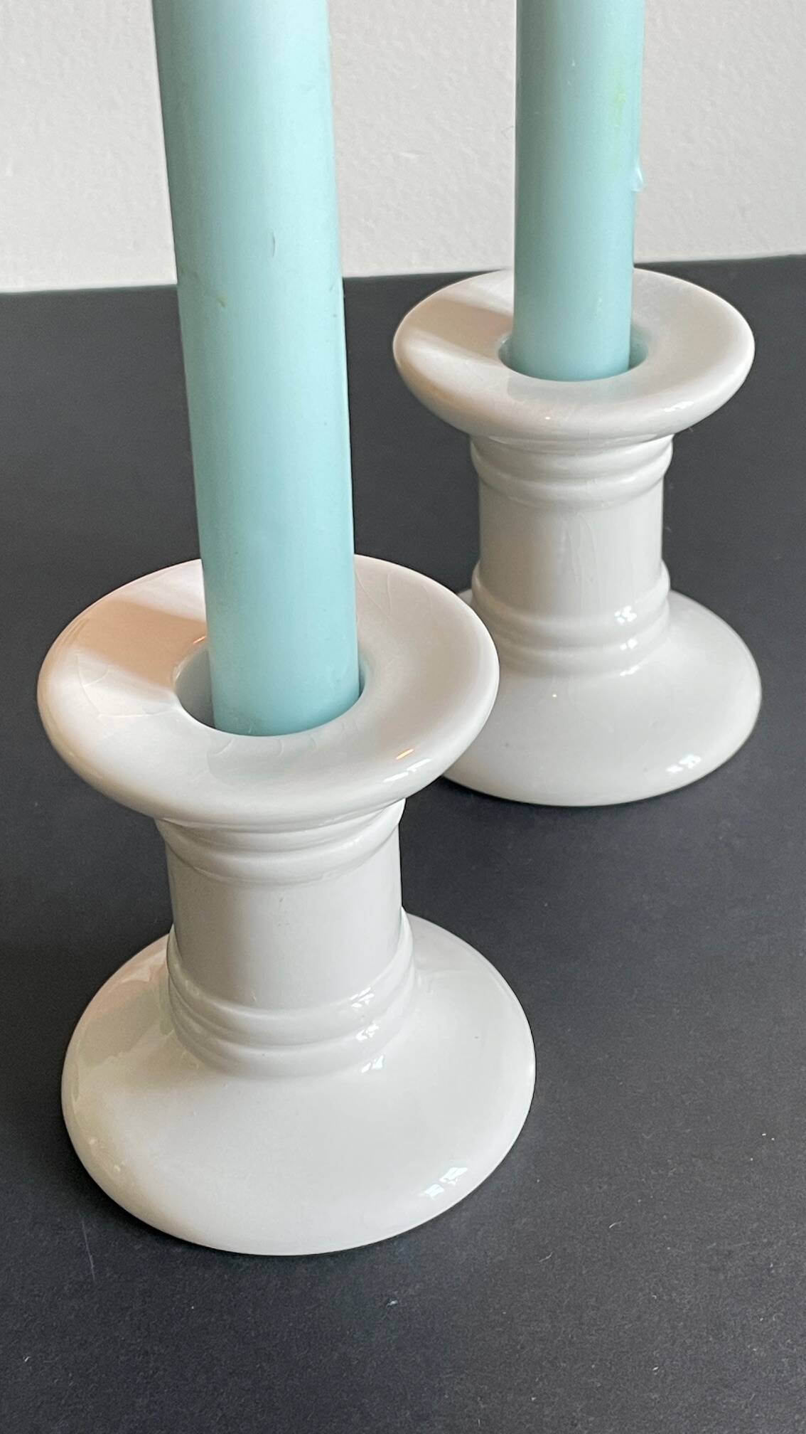 Pair of White Ceramic Candlesticks