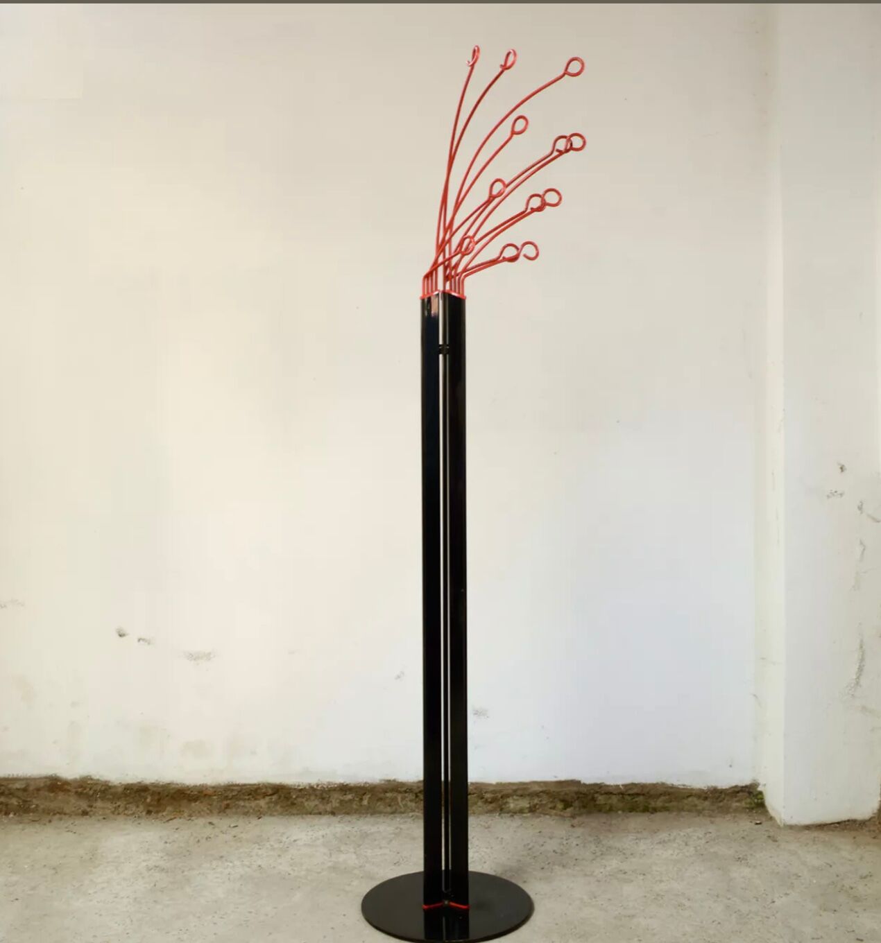 Coat rack on foot metal red and black 12 branches, 80s