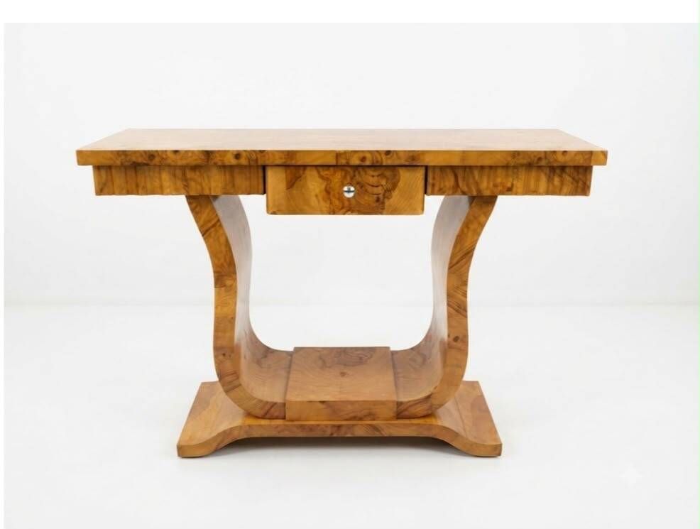 An Art Deco console made of beech wood and elm burl with a drawer.