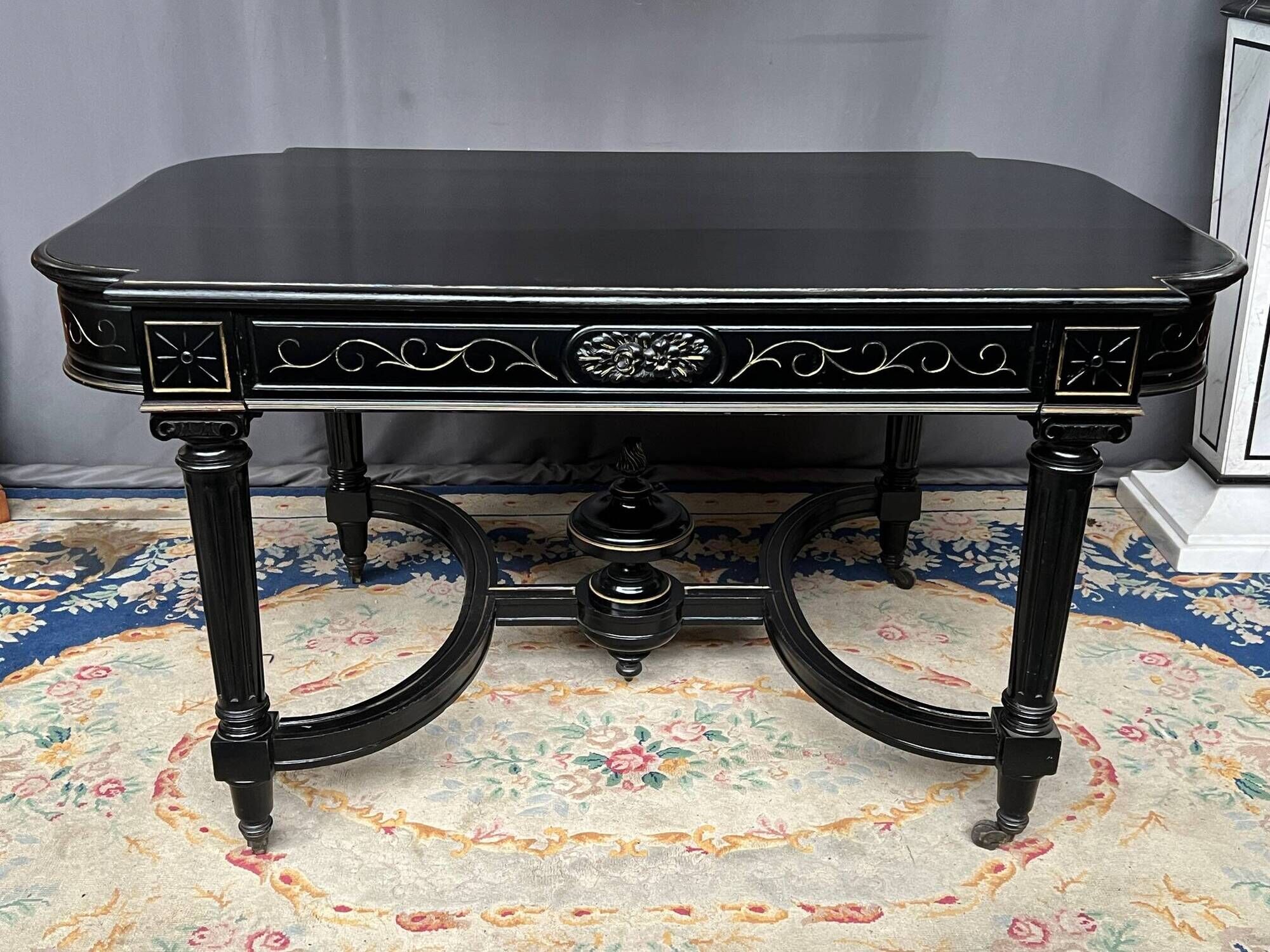 Dining room set consisting of a table and six chairs from the Napoleon III period.