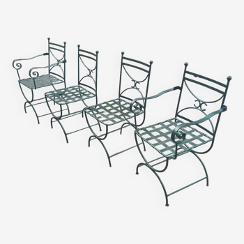 Deux fauteuils et deux chaises de jardin en fer forgé 20 eme