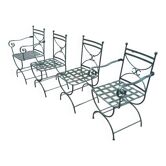 Deux fauteuils et deux chaises de jardin en fer forgé 20 eme