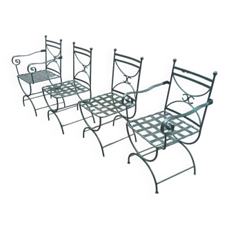 Deux fauteuils et deux chaises de jardin en fer forgé 20 eme