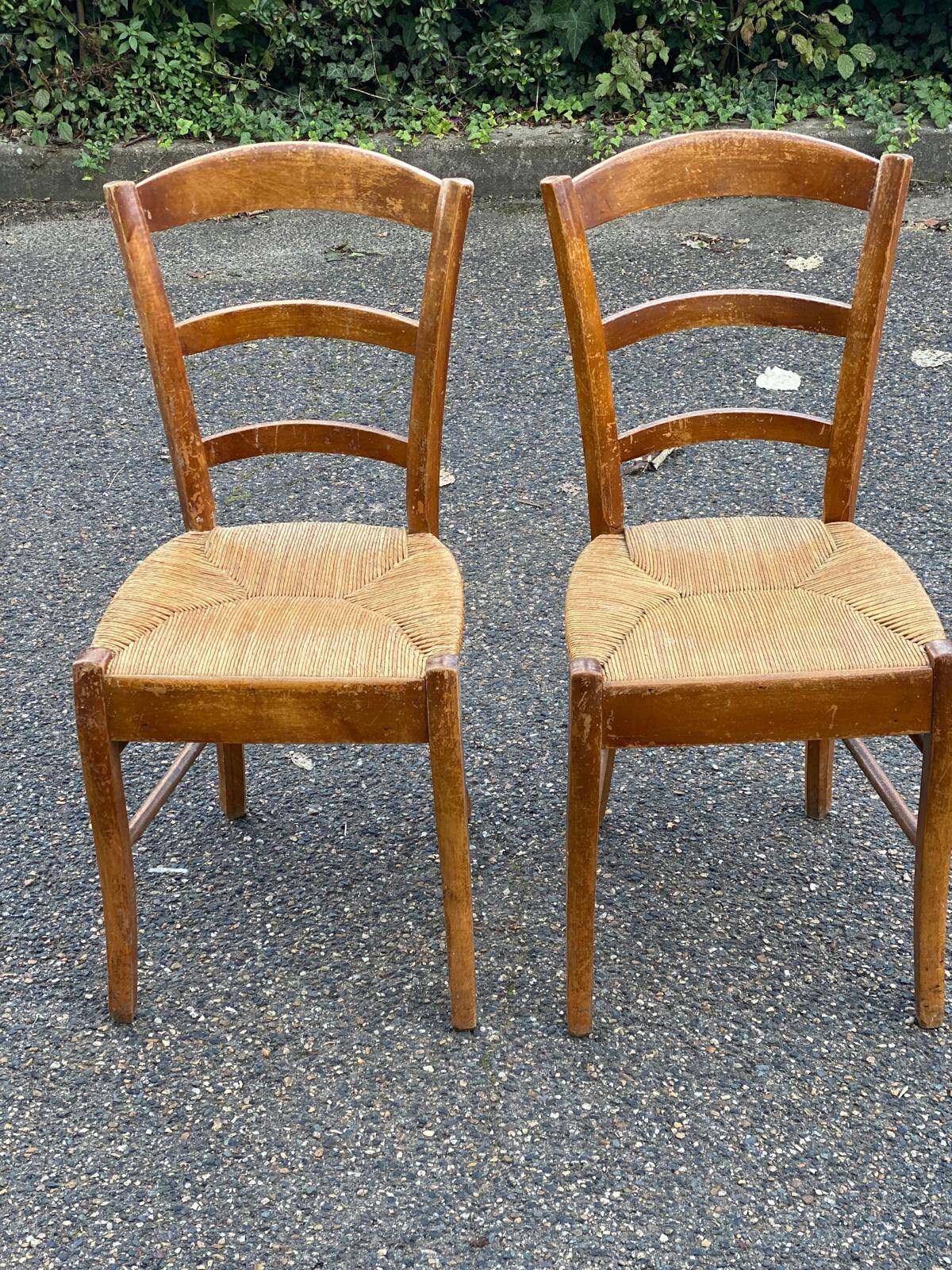 2 solid wood and straw dining chairs