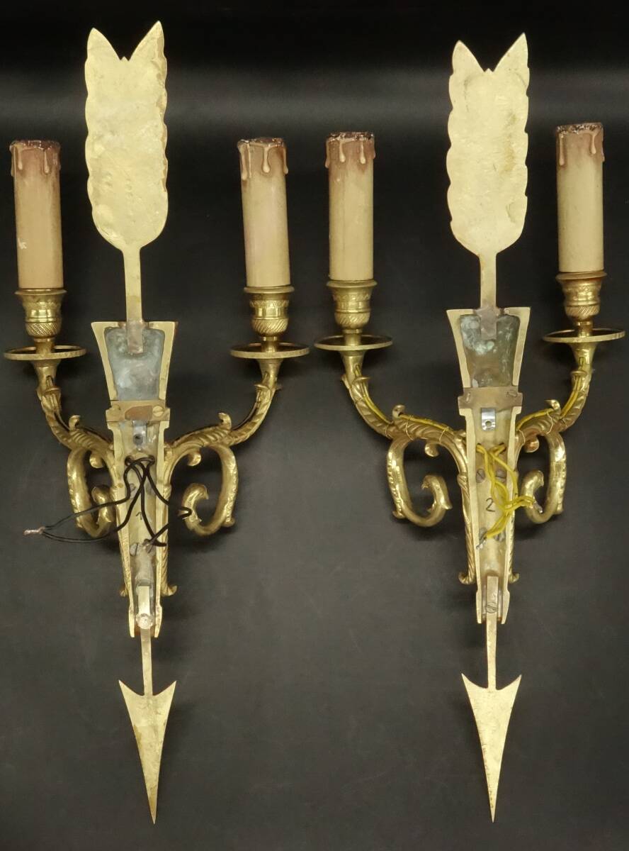 Paire d'appliques en bronze doré flèche et têtes d'aigle style Empire