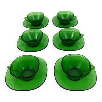 Green transparent glass cups and dishes