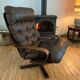 Vintage leather armchair with wooden armrests
