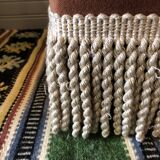 Duo of old pink poufs with fringes