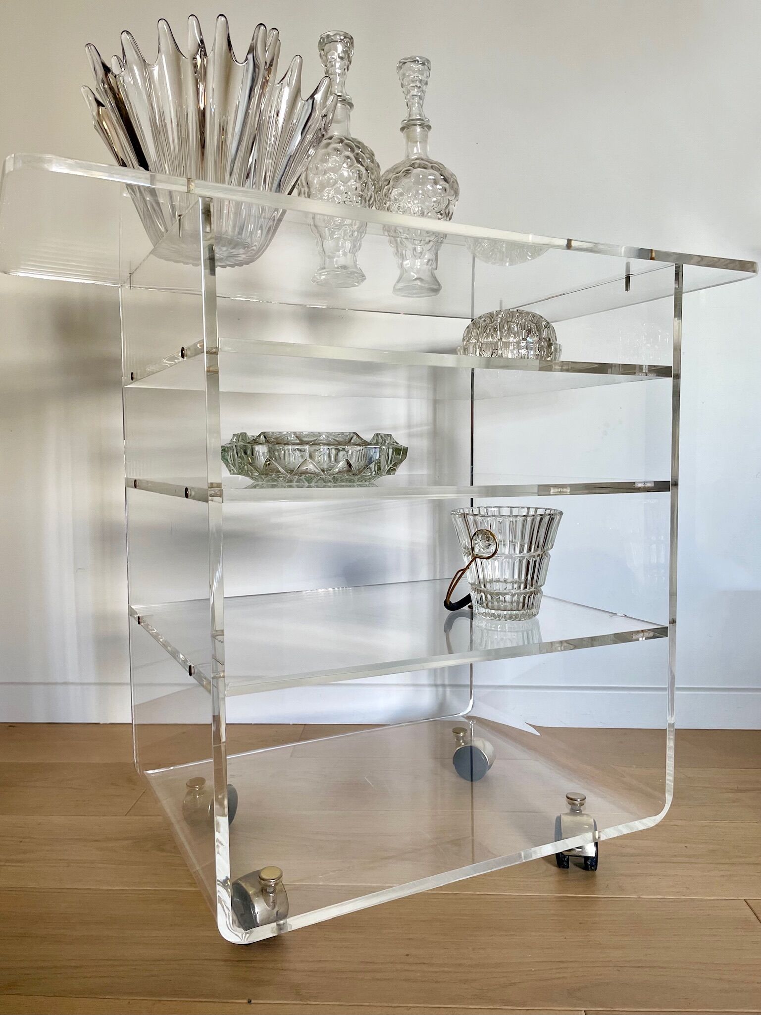 Transparent plexiglass TV stand