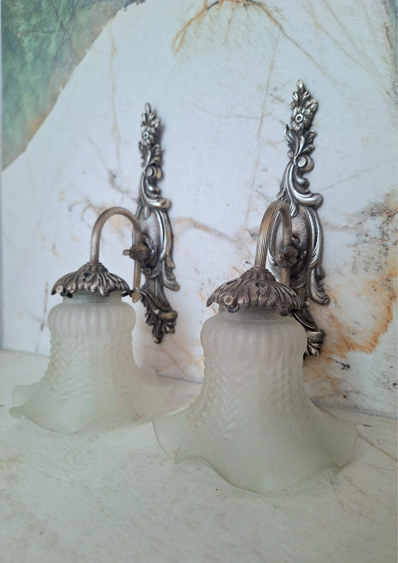 Pairs of Art Deco wall lights, antique fixtures.