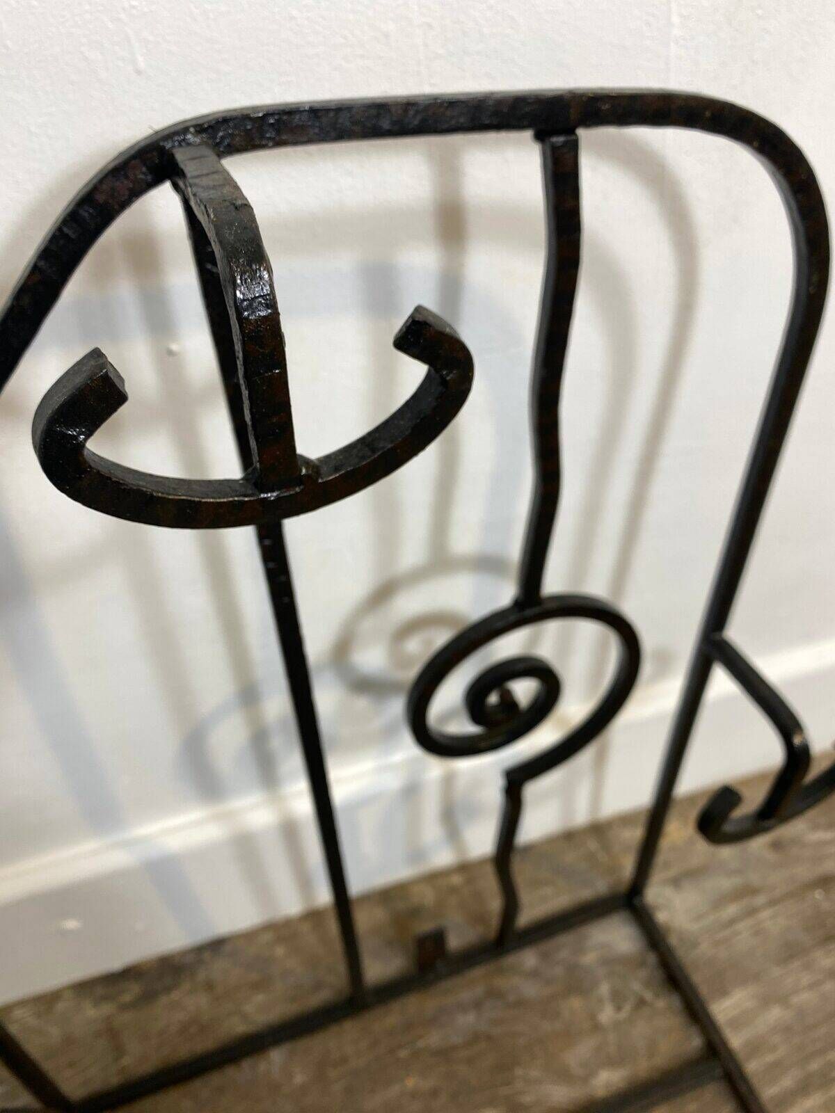 Wall-mounted coat rack in wrought iron, early 20th century