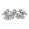 8 tasses à café  avec soucoupe en porcelaine de Limoges liseré doré et motif fleuri