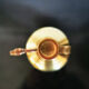 Brass spray