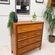 Vintage chest of drawers with tapered legs