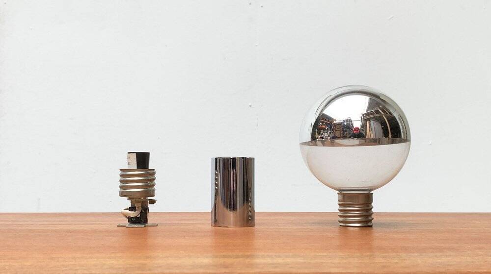 Vintage wall lamp from the German space age by Motoko Ishii for Staff, 1970s.