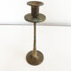 Old golden brass fish candlestick