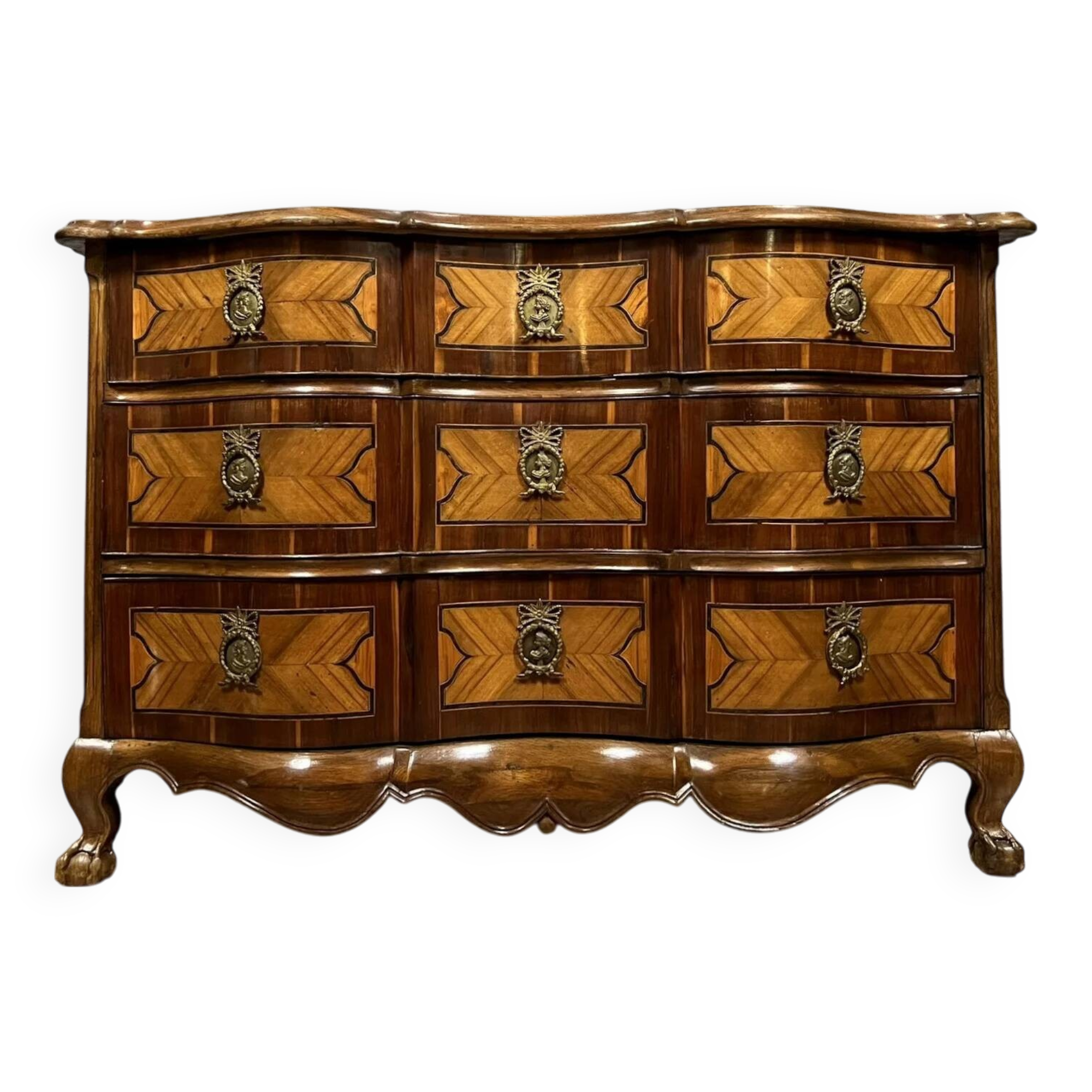 Louis XV period Arbalète chest of drawers in noble wood marquetry