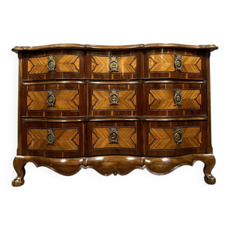 Louis XV period Arbalète chest of drawers in noble wood marquetry