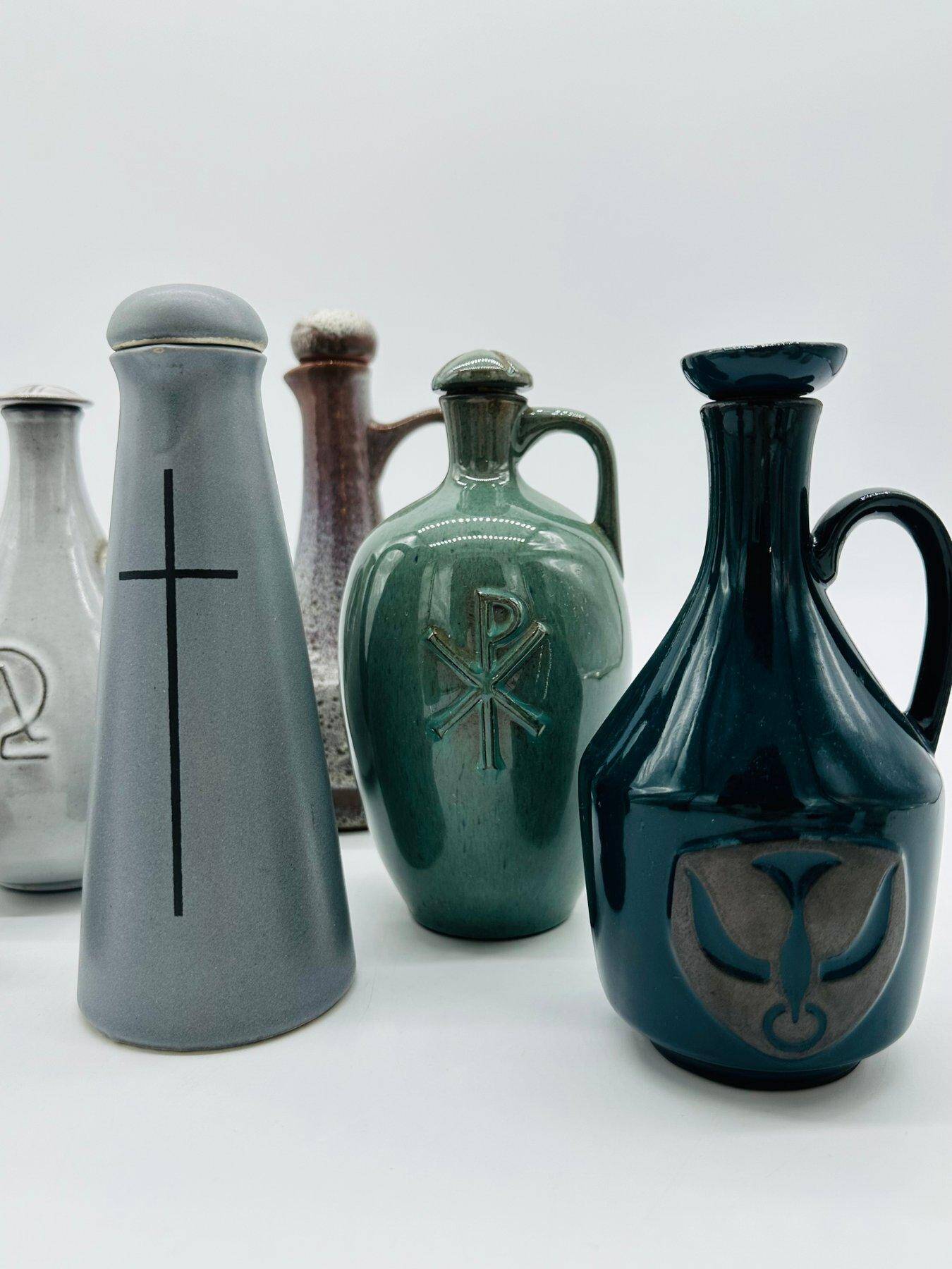 Set of nine modern sculptural ceramic vases from the mid-century, Bauhaus influence.