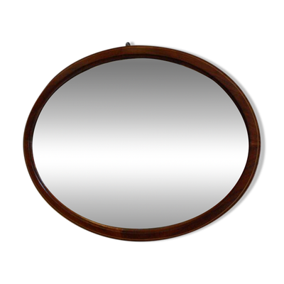 Miroir ovale en acajou ancien