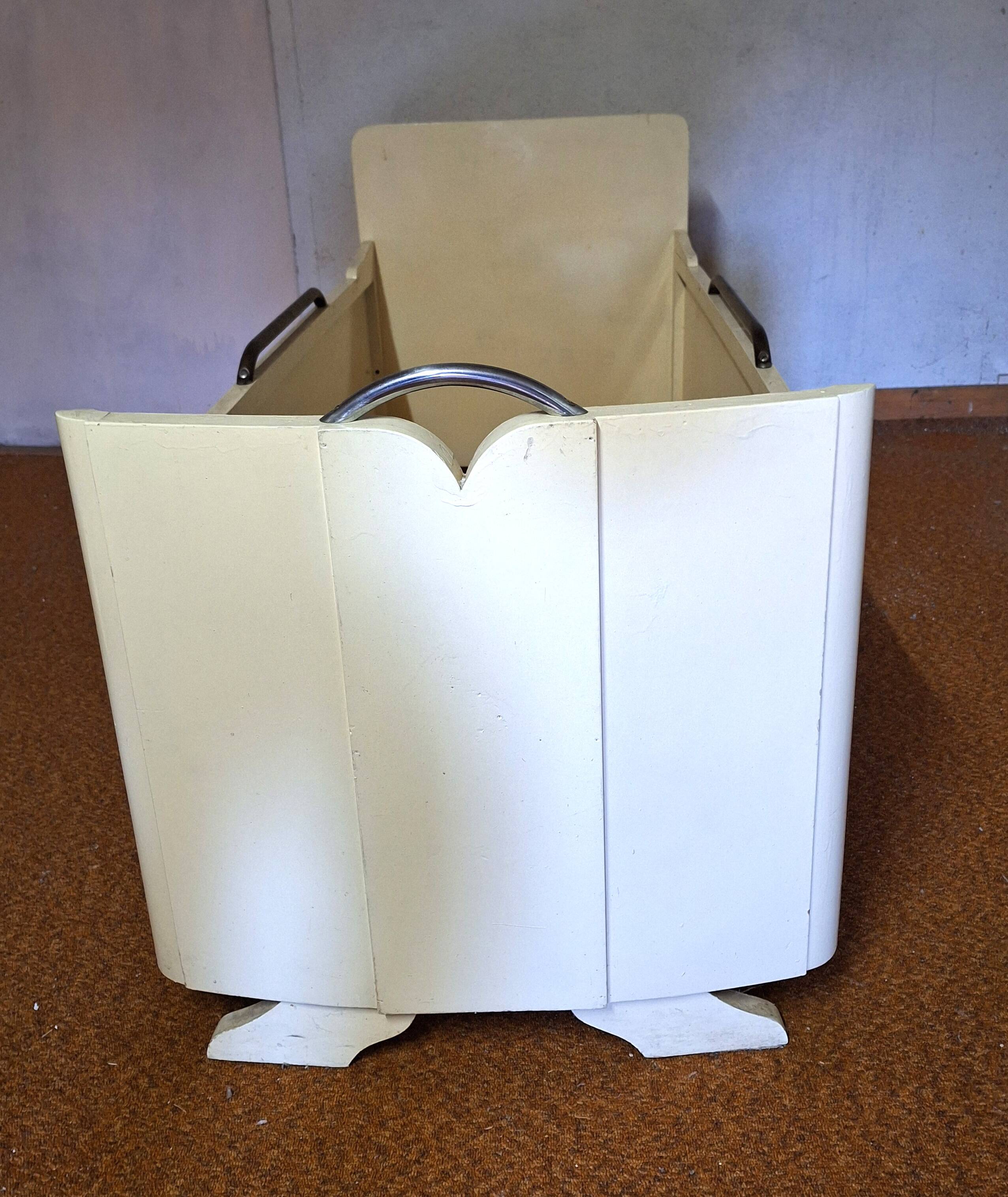 Painted wooden child's bed.